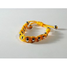 Bracelet with spheres in steel and macramé. Yellow