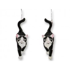 Zarah earrings with silver plated pendants and enamel. The black and white cat